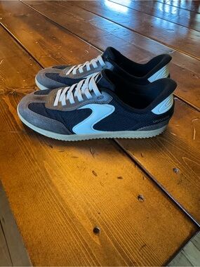 Skechers Slip On Casual sneakers. Like new! Black, brown and white.